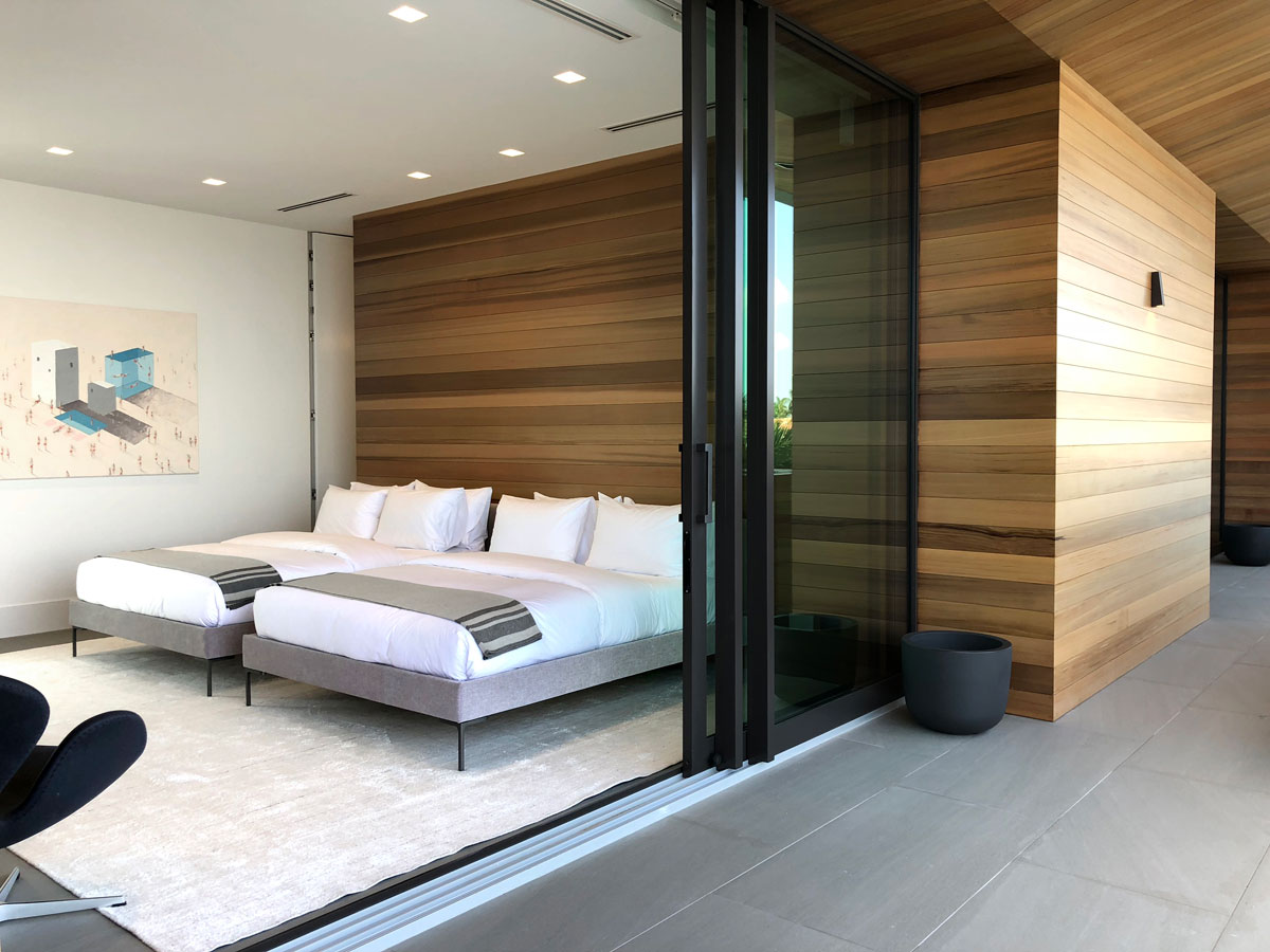 indoor outdoor modern bedroom architecture and interiors with cedar wall and soffits.jpg