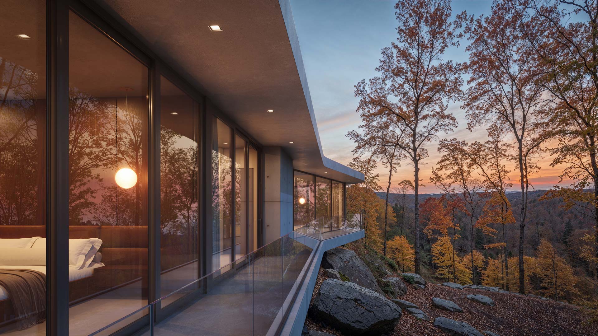 Modern concrete and glass home on a steep slope hudson valley architecture