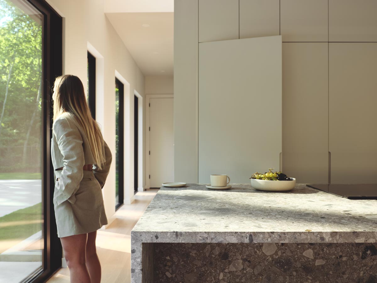 custom limestone island in modern home kitchen design