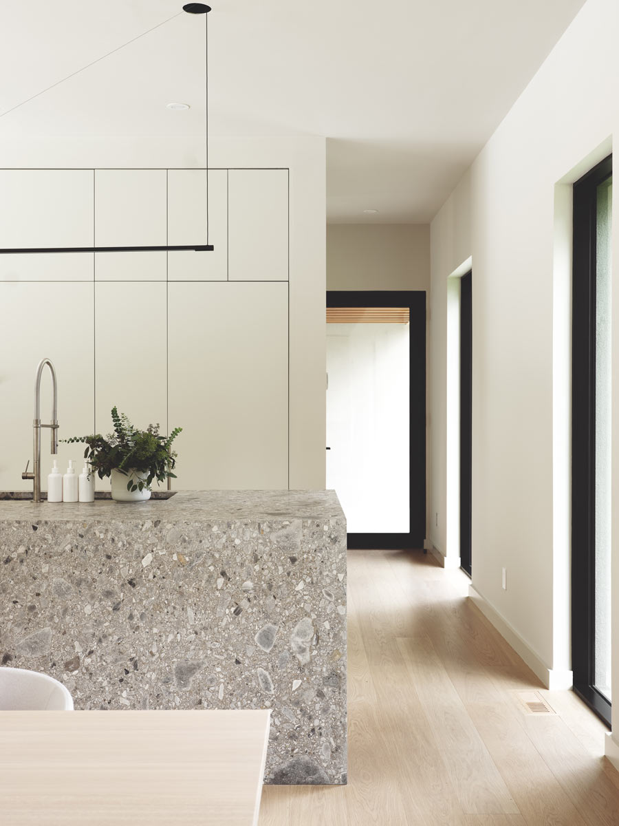 custom limestone kitchen island in scandinavian modern home design