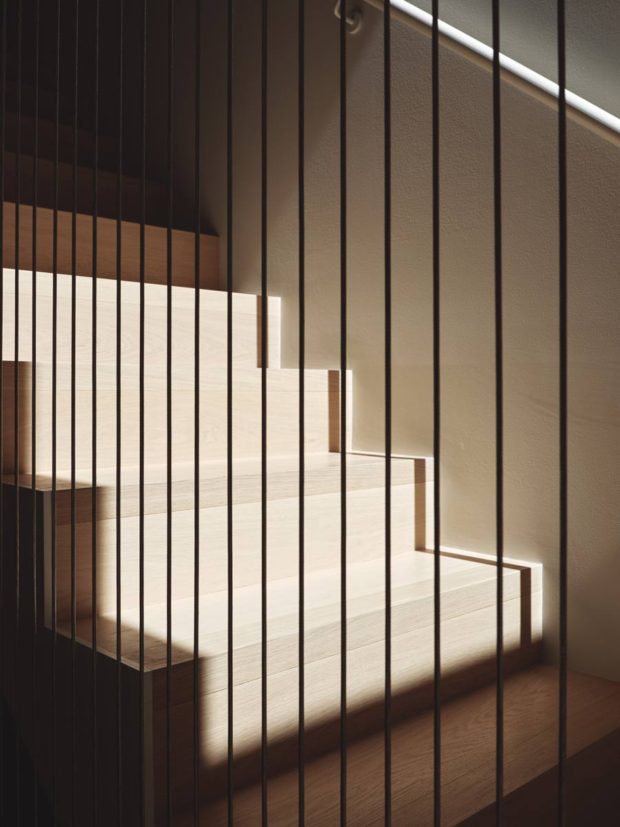modern interiors with custom wire rail stair design