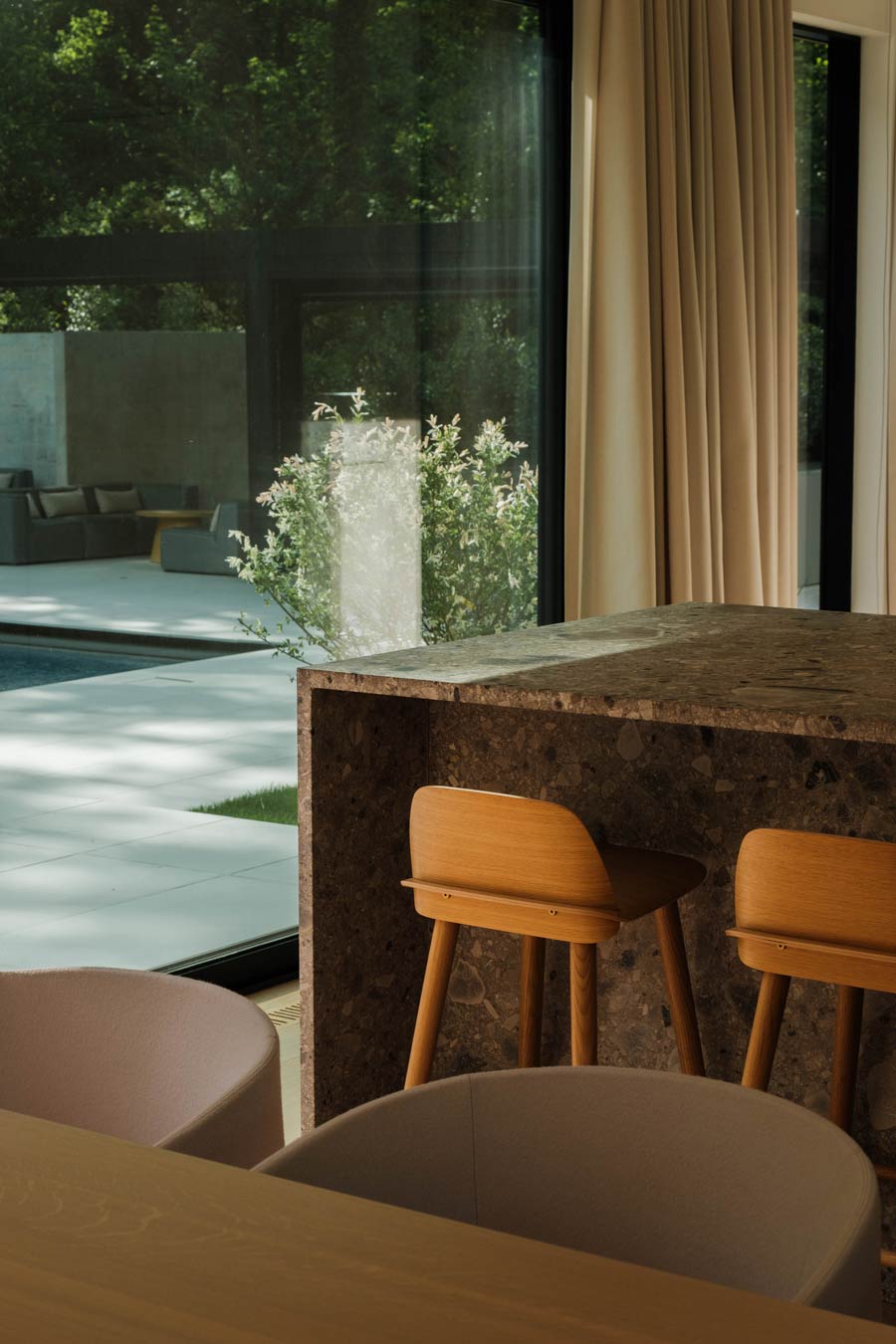 organic modern wood and stone kitchen in scandi modern home