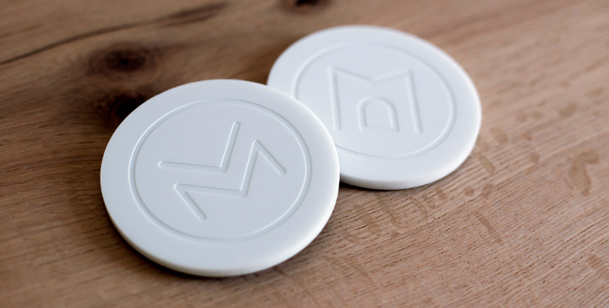 Doctors Office Branding Design on White Acrylic Coasters