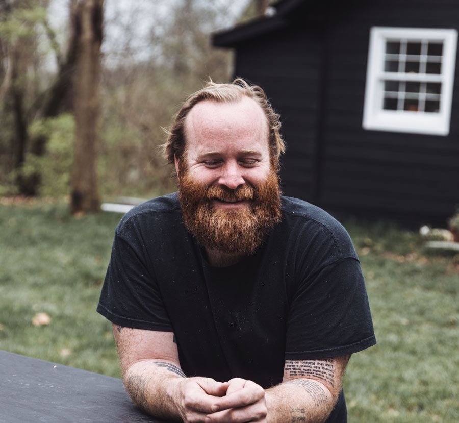 Portrait of general contractor Tristan Warner.