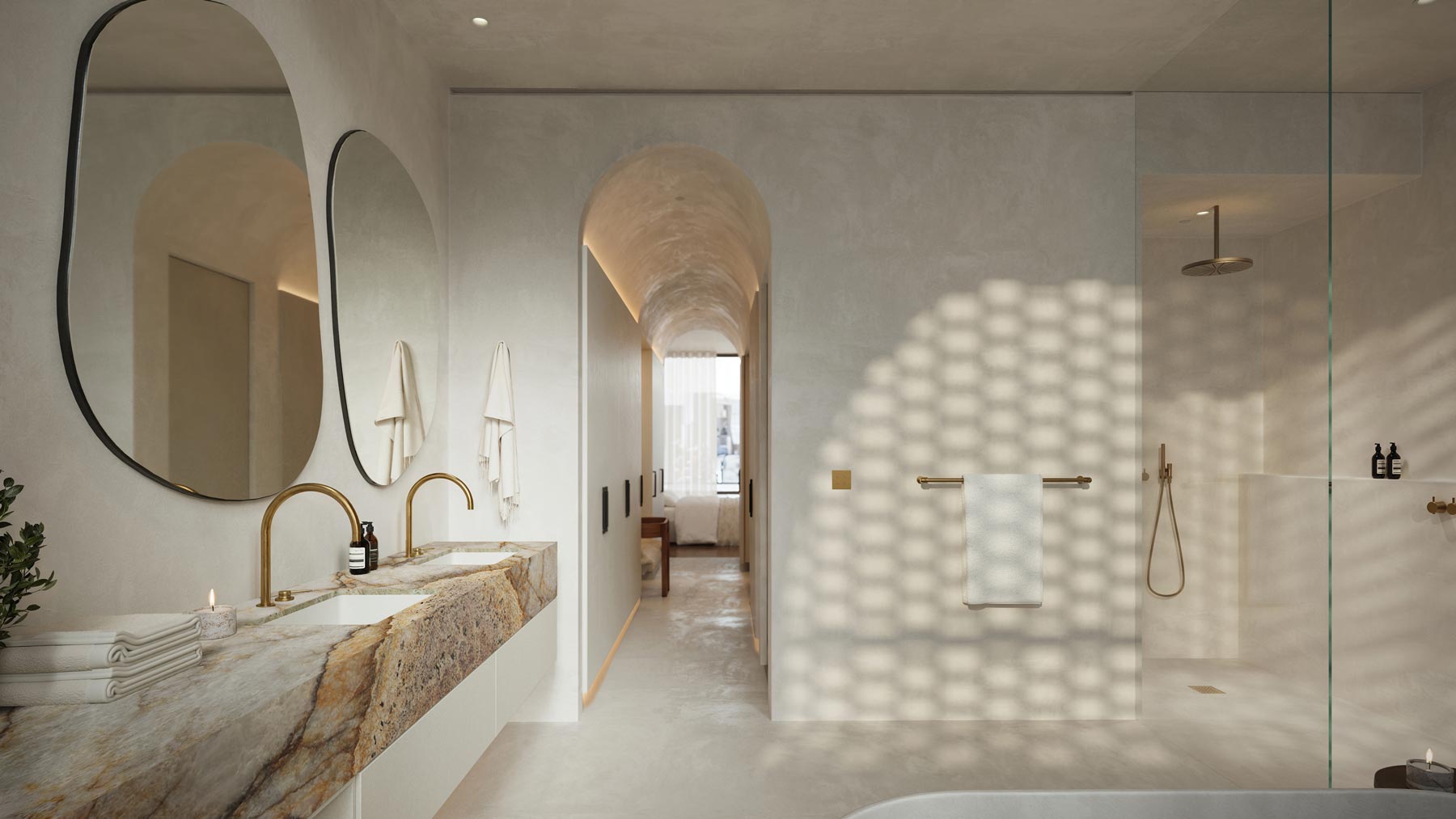 Custom townhouse bathroom with arched doorways and brick-screened window