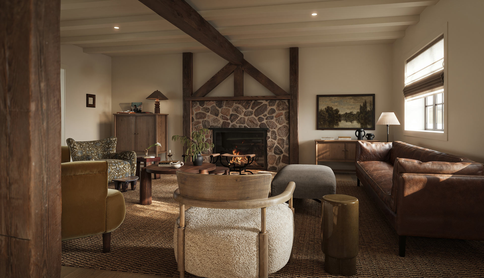 rustic catskills living room interior design with exposed timber beams stone fireplace