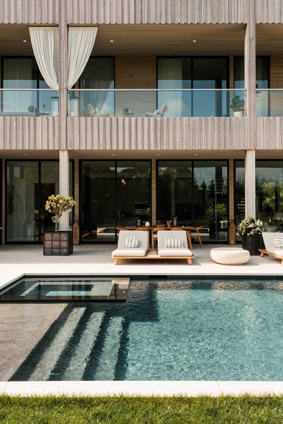 hamptons house party pool and outdoor dining balconies