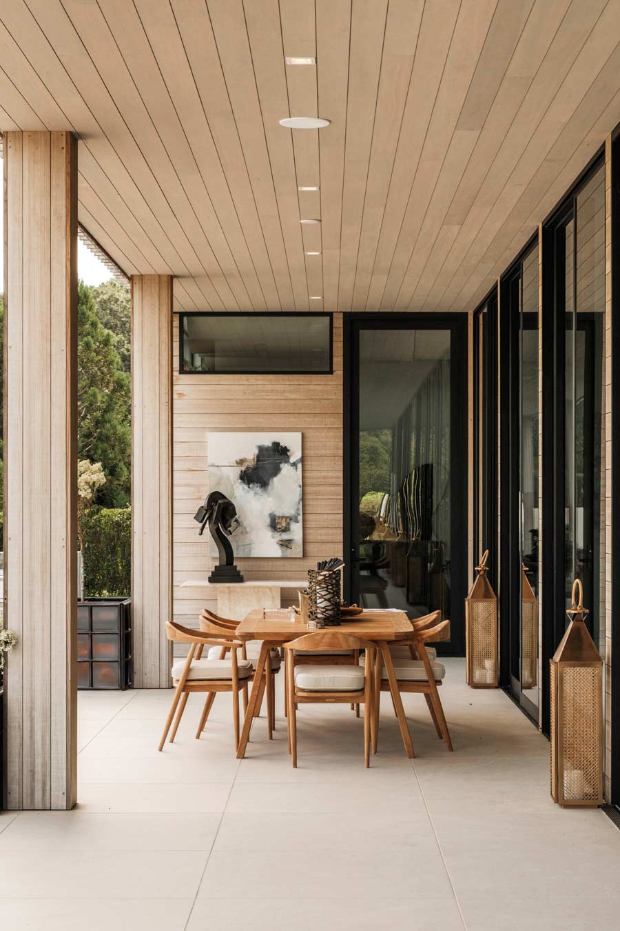 outdoor dining furnishings in custom modern hamptons home