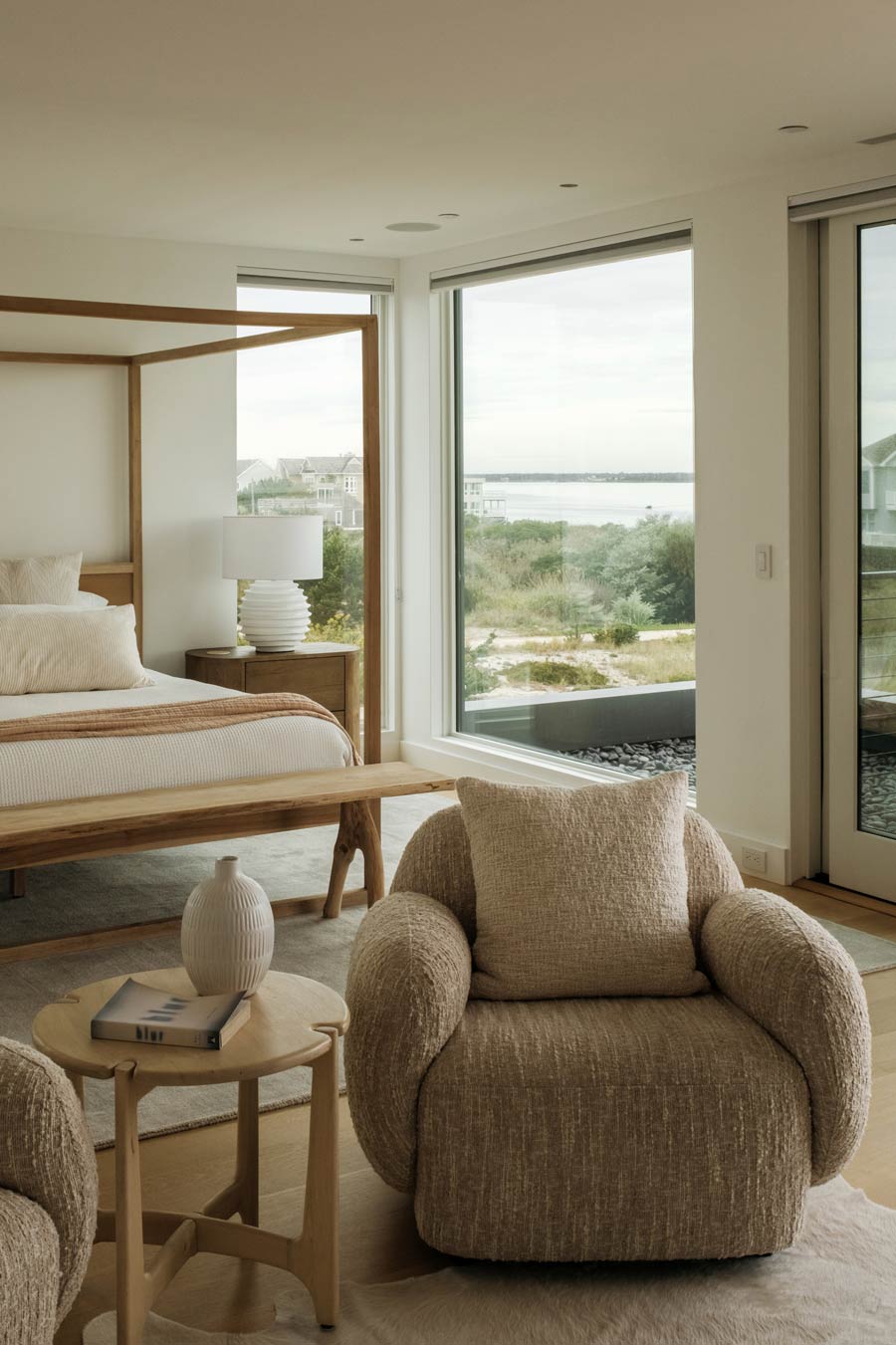 primary bedroom interior design in custom modern dune road beach house