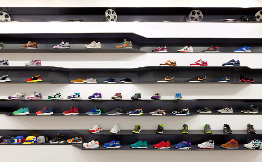 Custom millwork extruded sneaker shelving design