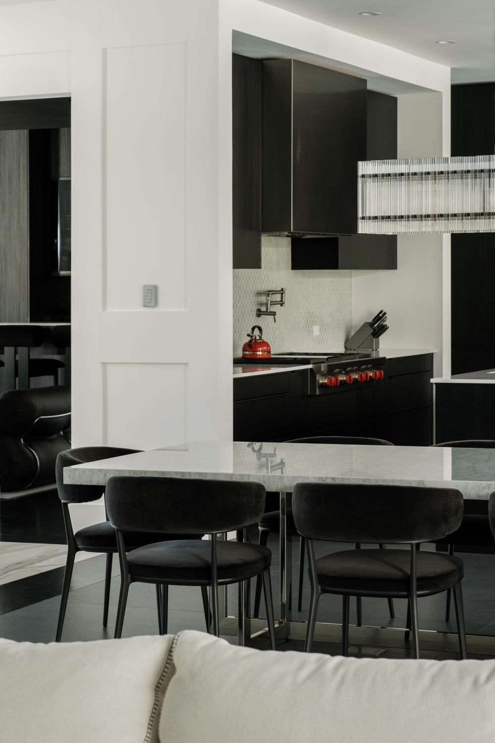 black and white open kitchen dining living room floorplan