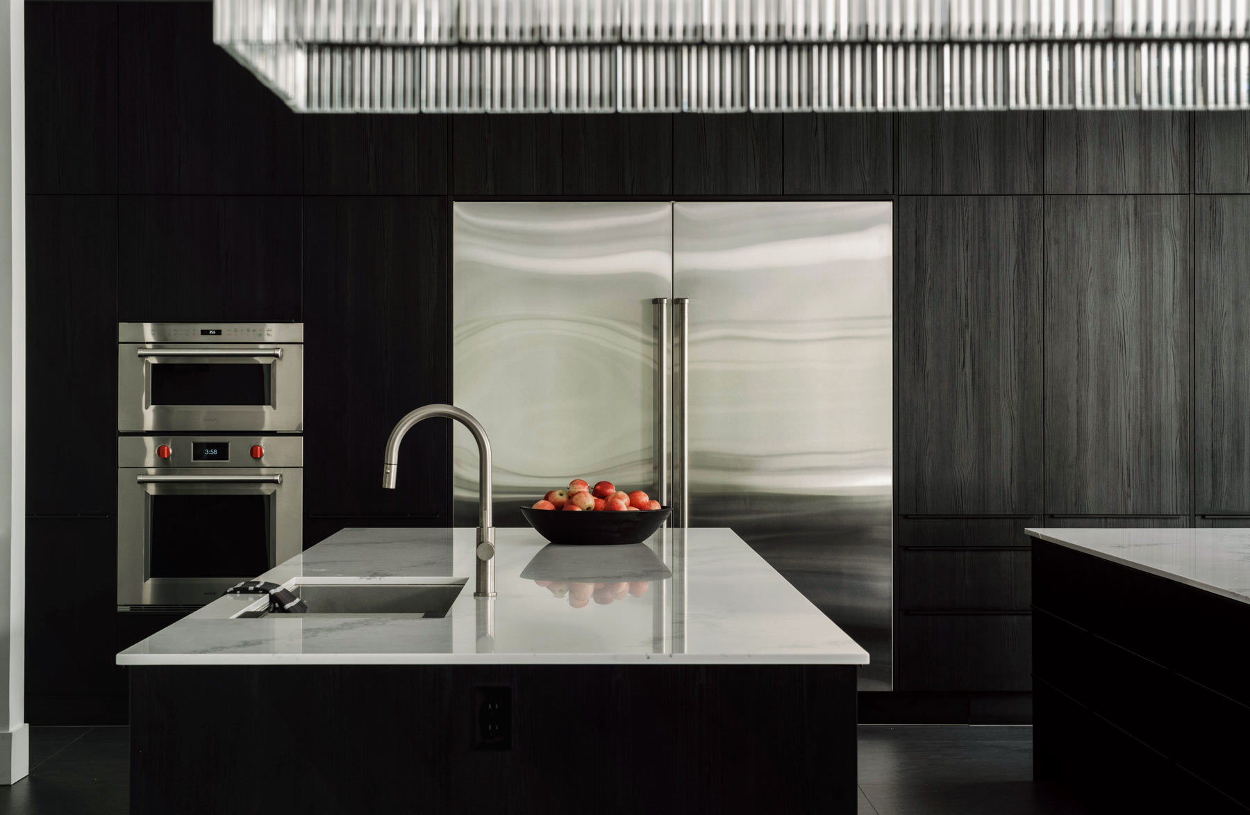black flat panel modern kitchen interior with double island