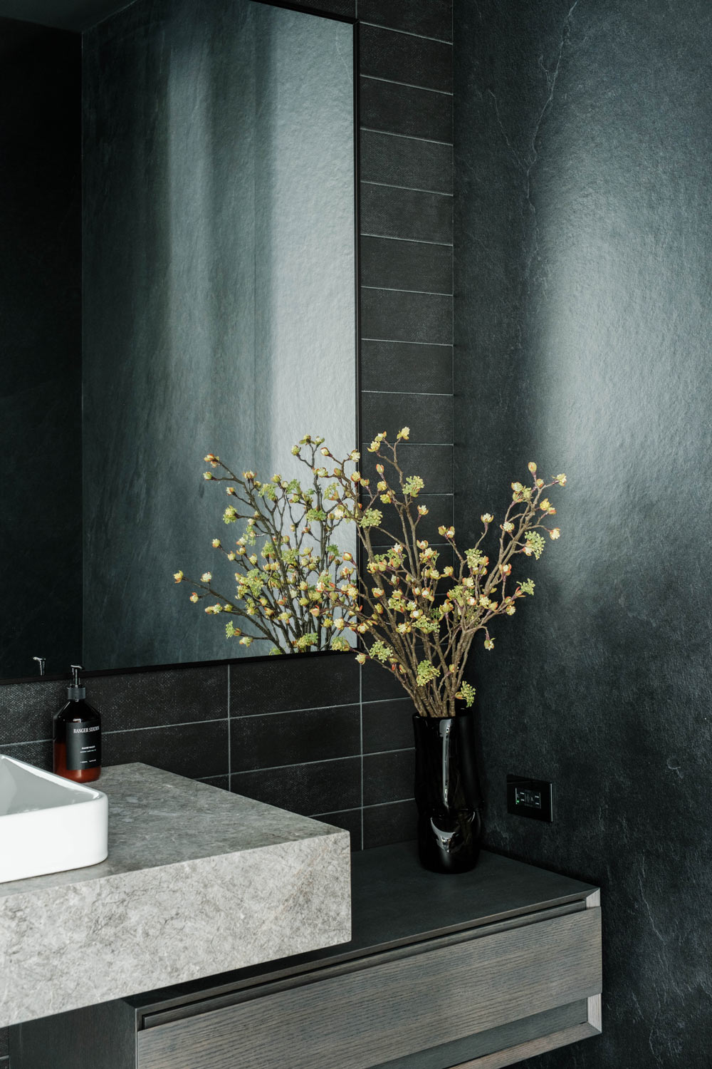 black micro cement and tile modern bathroom interiors