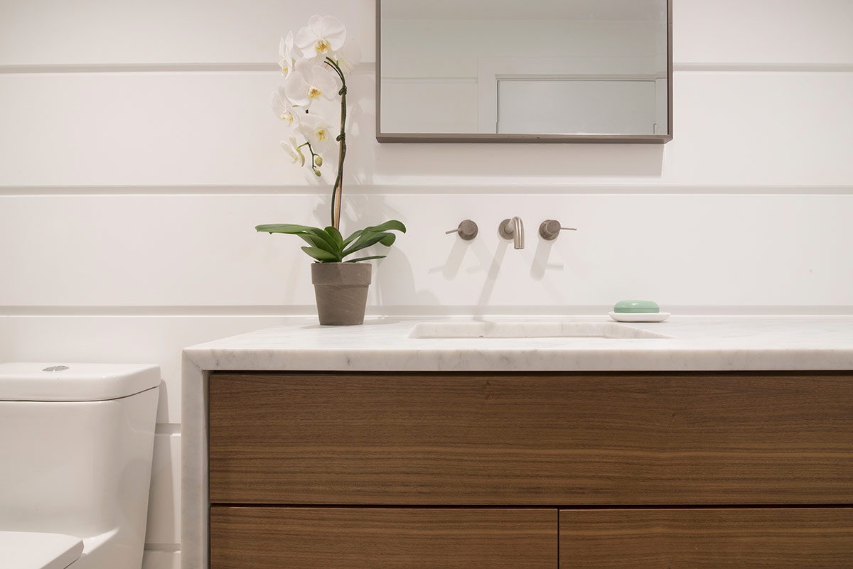 Custom Interior White Stone and Walnut Bathroom Vanity Design