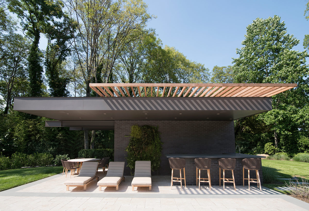 Modern Pool House with Cantilevered Outdoor Bar