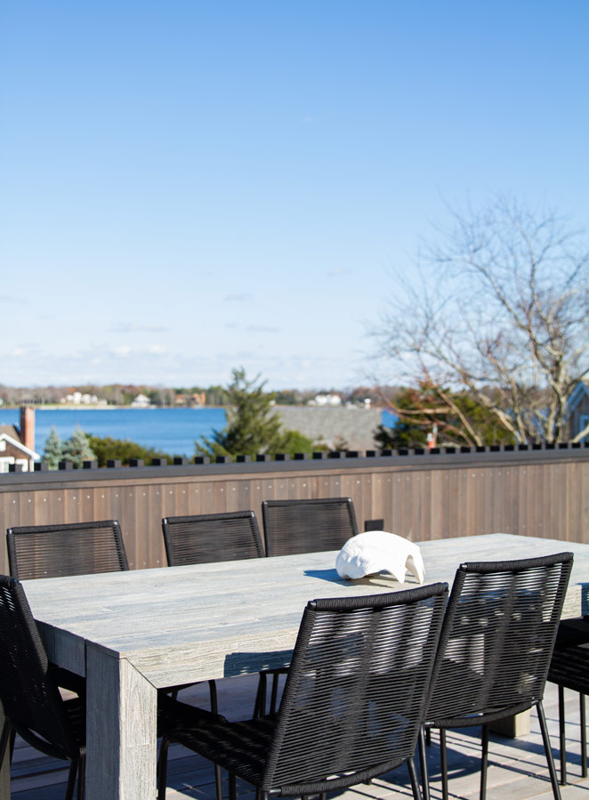 Hamptons architecture with modern roofdeck and water views