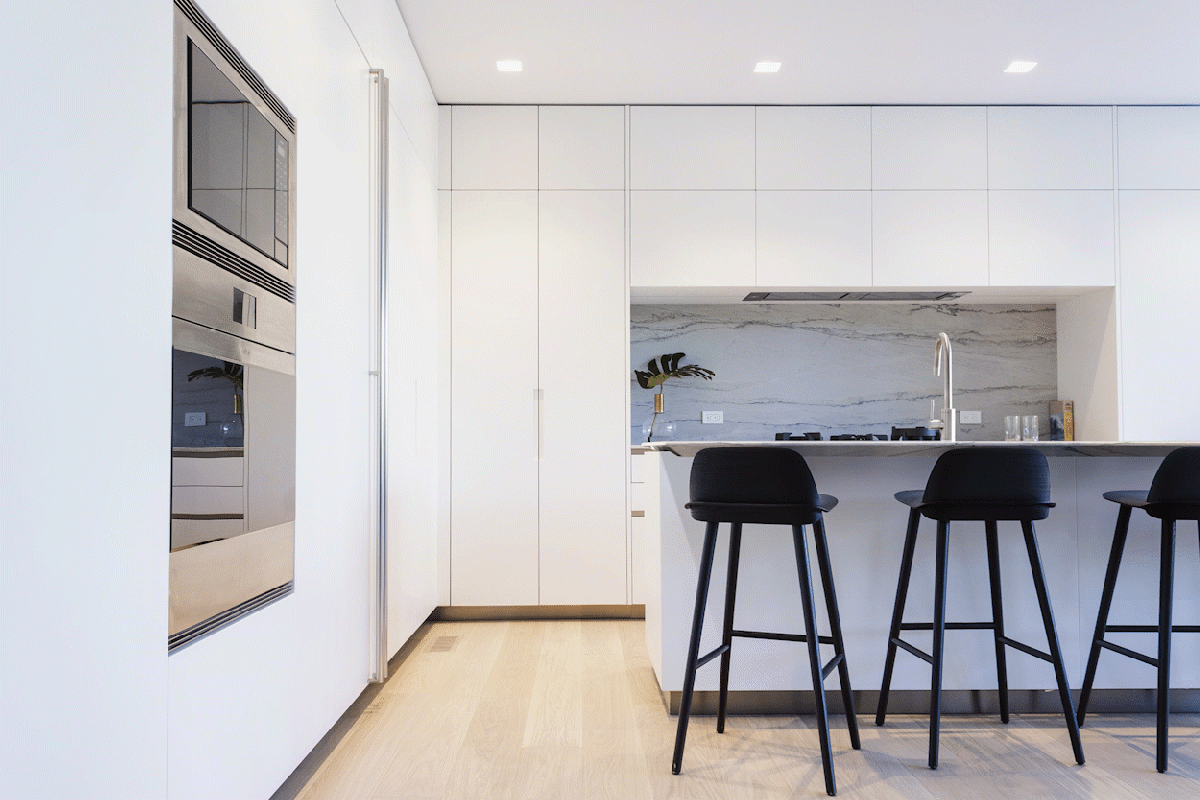 Minimal white kitchen interior storage