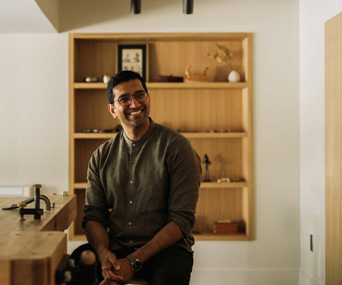 homeowner in custom modern woodshop