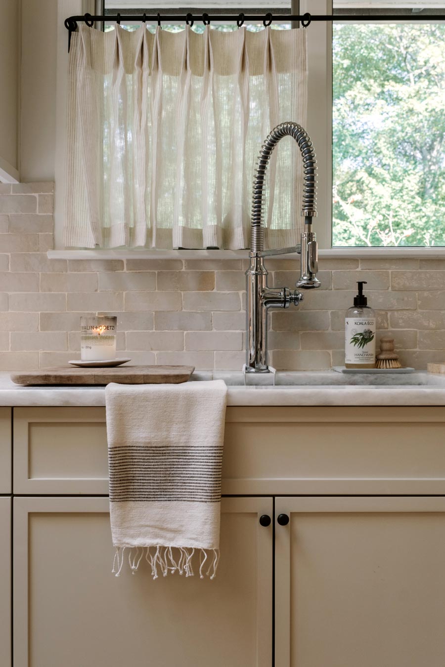 organic warm tan kitchen cabinets with handmade tile