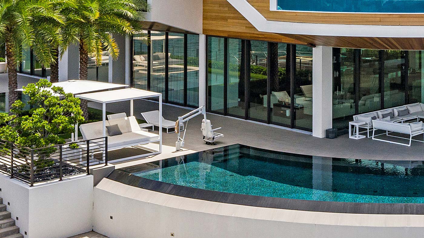 ADA Accessible Designs in a modern infinity pool design by The Up Studio.