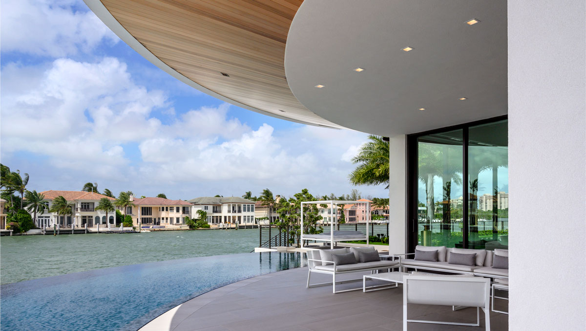 infinity pool and modern patio at boca raton concrete residence