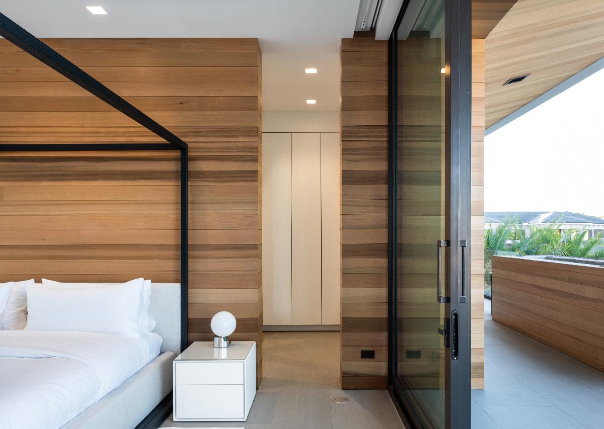modern bathroom interior architecture with natural cedar wall, en suite and private balcony