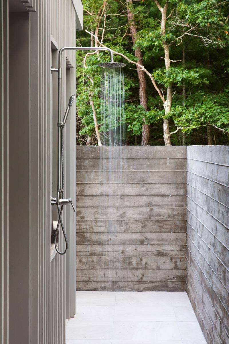 modern outdoor shower architecture and board formed concrete