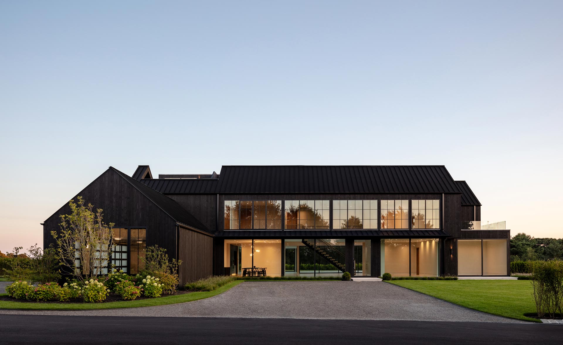 black wood modern farmhouse architecture design on hamptons farm reserve