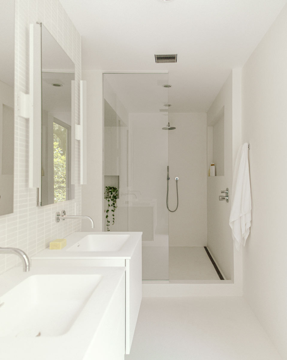 all-white bathroom interior minimal wetroom shower