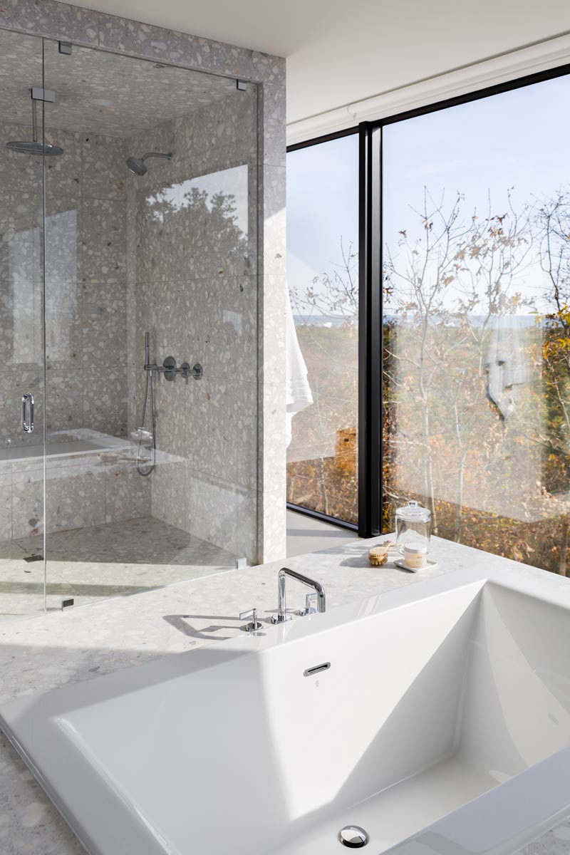 custom modern terrazzo marble shower and floating tub