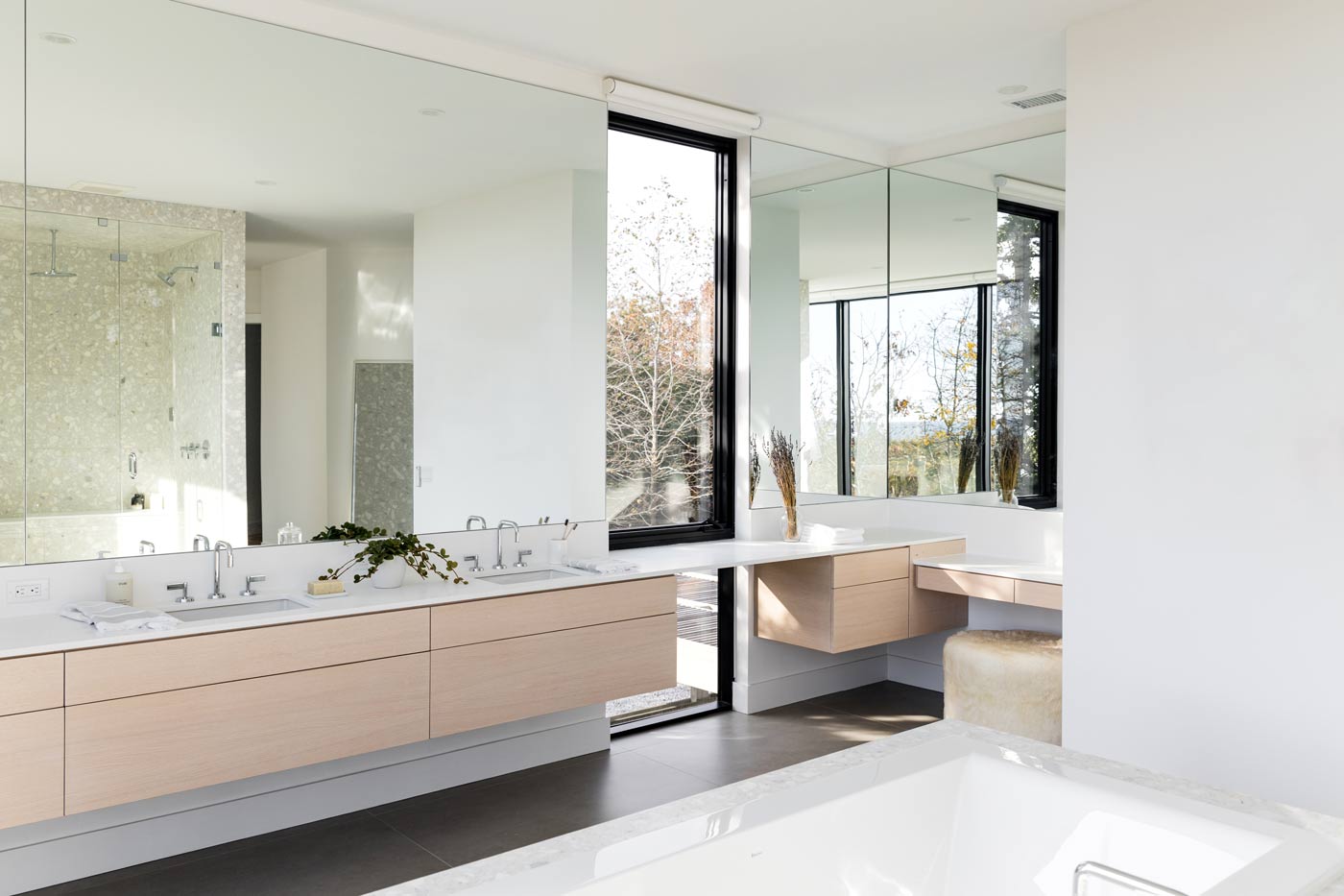 modern floating bathroom vanity interiors with custom terrazzo tub