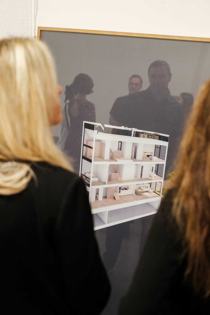 narrow nyc townhouse architecture large framed rendering at event