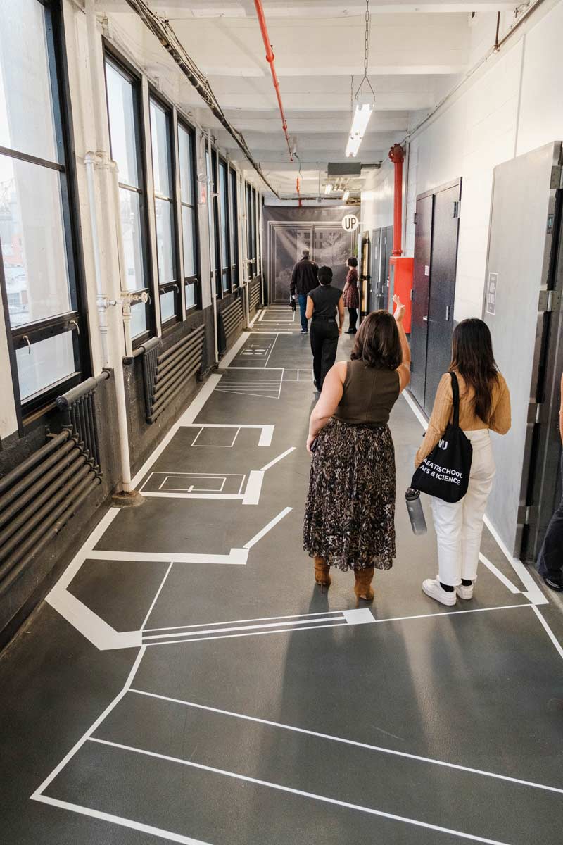 narrow nyc townhouse architecture full scale model taped out on the floor of a design studio