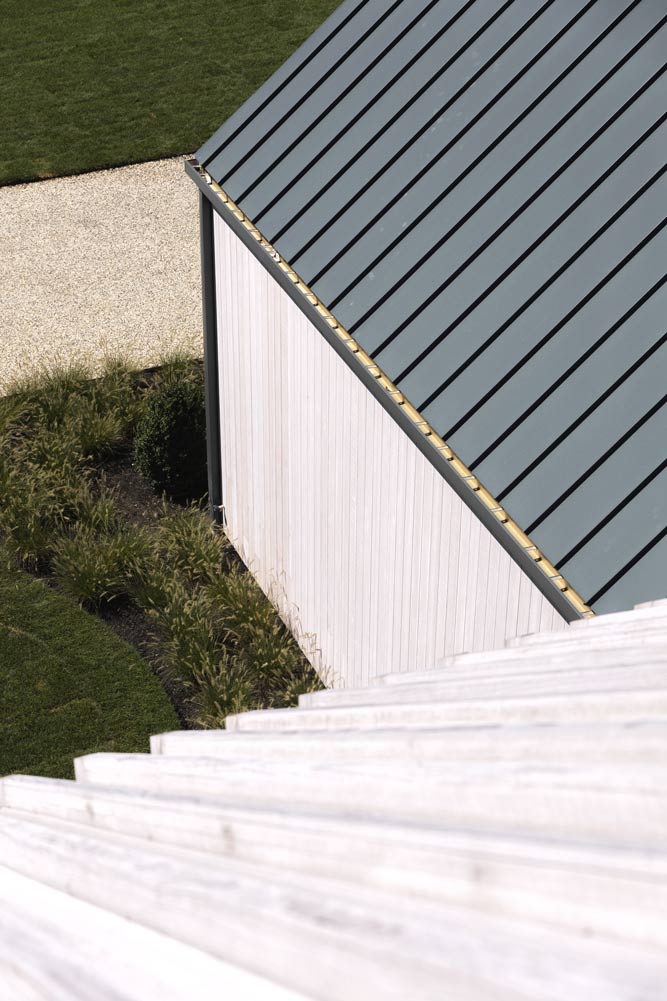 modern farmhouse wrapped wood roof and tin metal roof detail